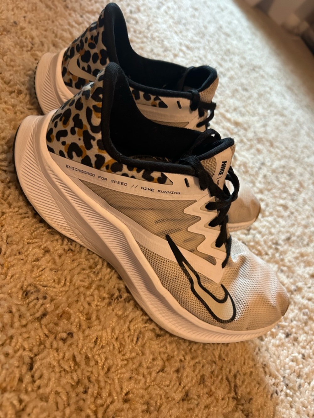 Nike Women's White and Black Running Shoes with Leopard Accent